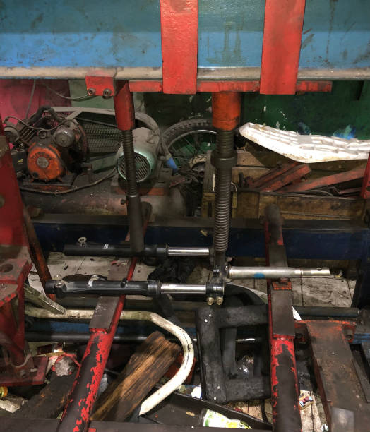 istock Crooked vario motorcycle steering wheel repairs are being pressed using an engine that is in a motorcycle repair shop in jember at night 1412670873