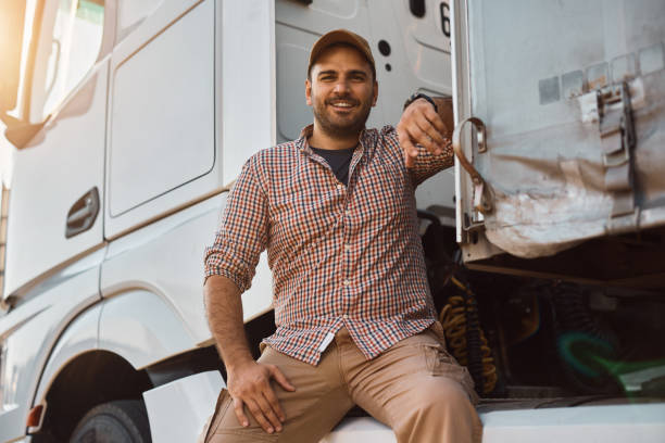 istock Young happy truck driver looking at camera. 1412671712