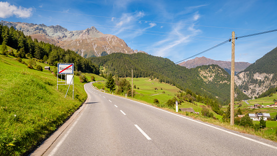 Nauders (Tyrol, Austria) is located near Italy (through the Reschen Pass) and Switzerland (through Norbertshöhe Pass). This is the road to the latter. It connects to the Swiss Lower Engadine Valley.