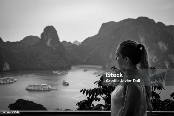 Tourist In Halong Bay On A Rainy Day Stock Photo - Download Image Now - Black Color, Mountain, Vietnam