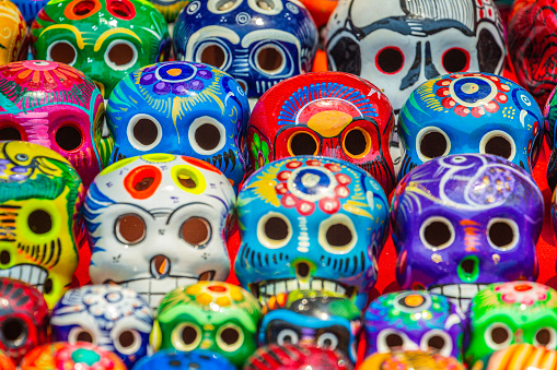 Colorful skulls souvenirs for day of the dead celebration, Cancun, Mexico\n\nThey are normal objects with no ornament or different shape that distinguish them, found everywhere in Mexico.