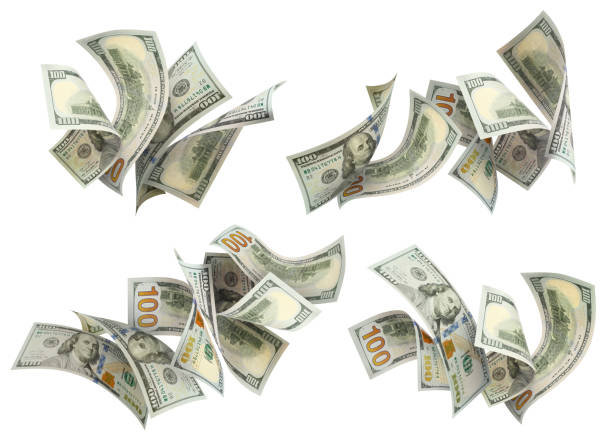 istock Collection of flying 100 American dollars banknotes, on white 1412677136