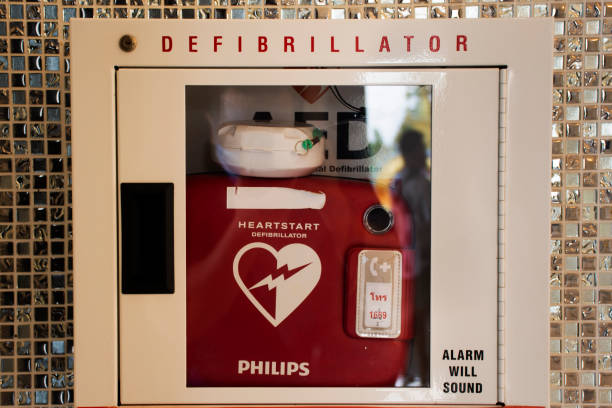 Emergency Automated External Defibrillator or AED at equipment station box for thai people rescuers use tools help care exigency patient stock photo