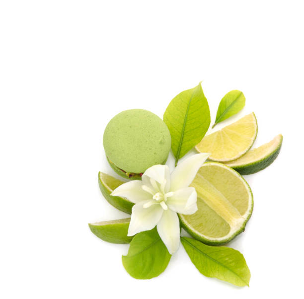 istock Citrus lime and green macarons on a white background. 1412682885