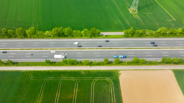 istock Agricultural fields and highway - aerial view 1412685024