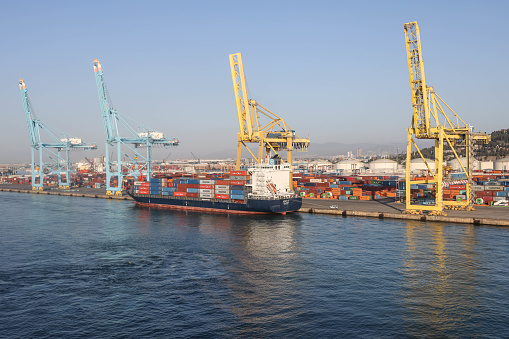 10th June 2022 - Shipping containers being loaded/unloaded at Barcelona port in Spain