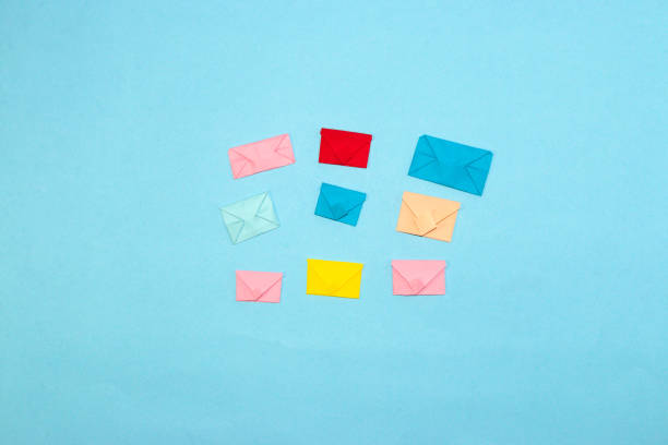 istock colorful envelopes on a blue background, creative art design, minimal concept 1412689070