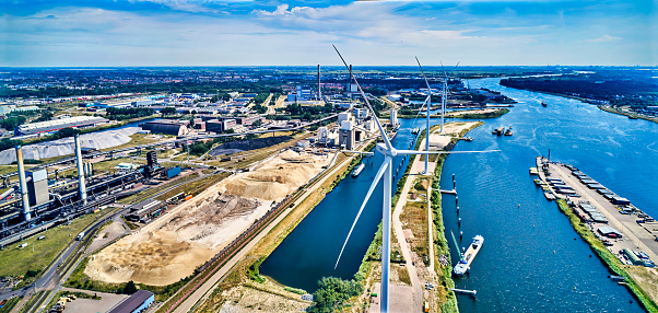 Netherlands, IJmuiden - 20-06-2022: Aerial view of heavy industry. Near the sea lock in the Noordzeekanaal.
