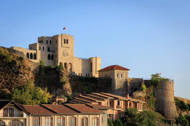 istock Kruja, Old Albanian town skyline at sunset 1412690494