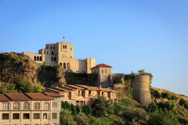 istock Kruja, Old Albanian town skyline at sunset 1412690495