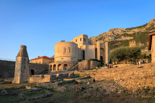 istock Kruja, Old Albanian town skyline at sunset 1412690529
