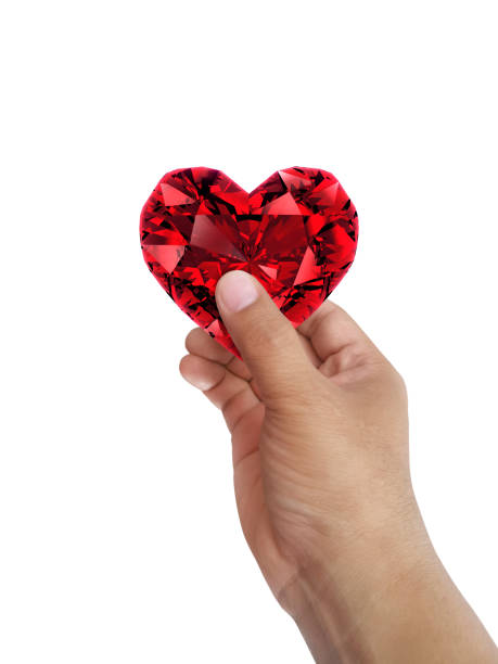 istock Hand holding red heart shaped diamond isolated on white background 1412696394