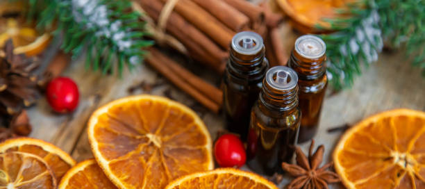 istock Christmas essential oils in small bottles. Selective focus. 1412696677