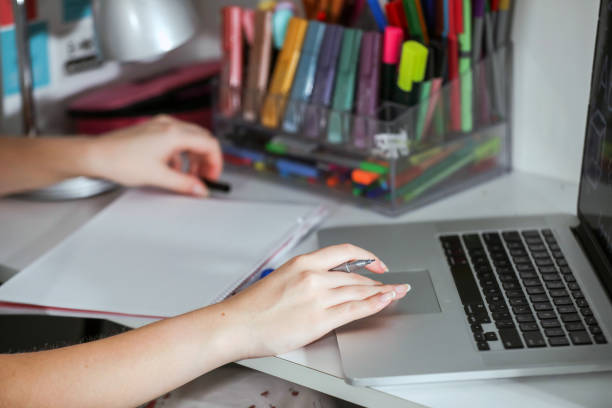 istock Young Doing Homework , University Preparation Studies , Back To School 1412696752