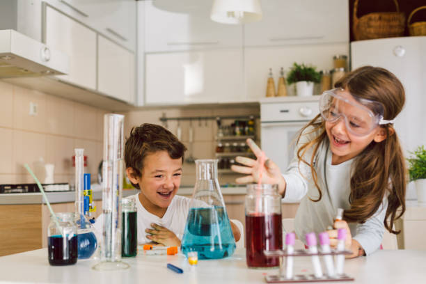 istock Children playing expreiments at home 1412698119