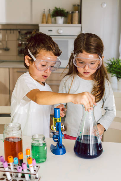 istock Children playing expreiments at home 1412698173