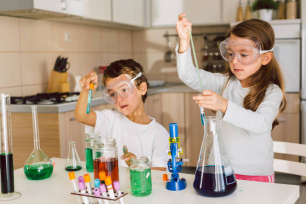 istock Children playing expreiments at home 1412698314