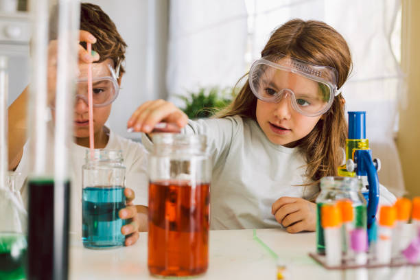 istock Children playing expreiments at home 1412698495
