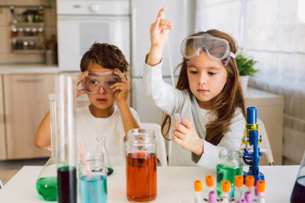 istock Children playing expreiments at home 1412698516
