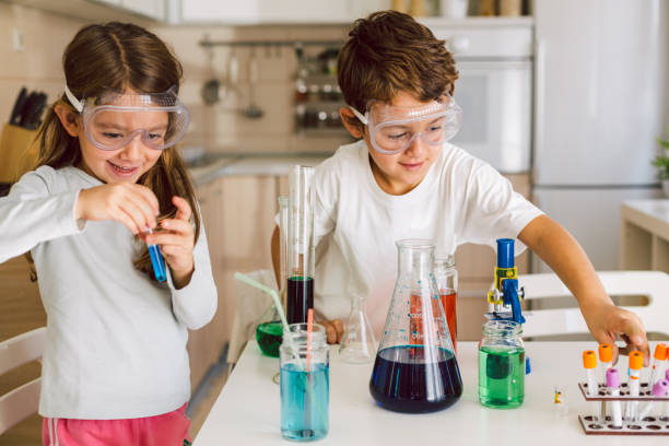 istock Children playing expreiments at home 1412698613