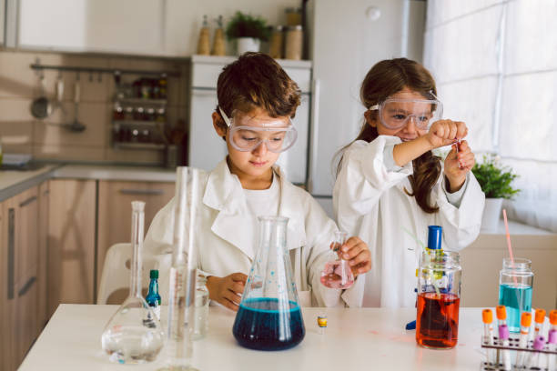 istock Children playing expreiments at home 1412699154