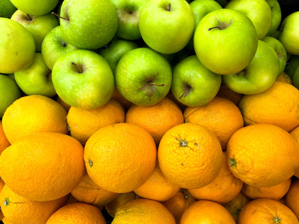 istock Bunch of organic lemons and apples 1412700470