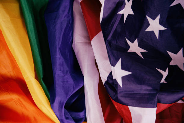 istock Equality. American and gay flag side by side. 1412700561