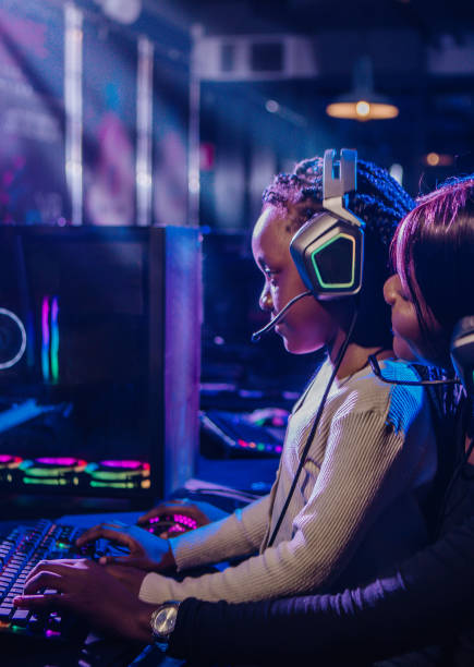 Black female child in a Esports Gaming Cafe stock photo