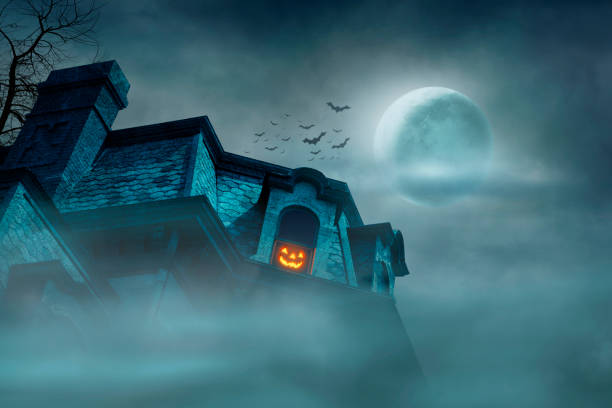 istock Haunted House In Front Of Full Moon 1412702311