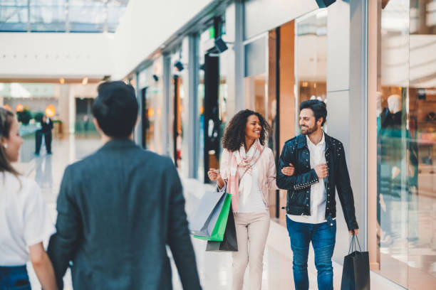 istock Couple in the shopping mall 1412703663