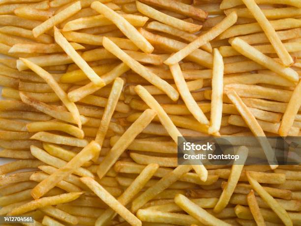 French Fries Background Stock Photo - Download Image Now - Unhealthy Eating, Close-up, Color Image
