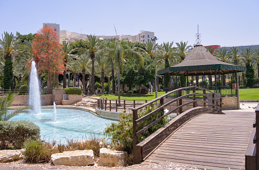 Lake with fountains, a bridge and a gazebo in Gan HaMoshava Park in Rishon Lezion