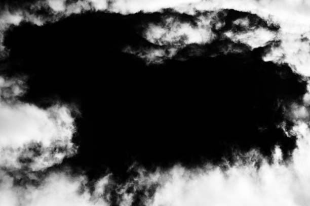 istock White cloud or smoke isolated on black background. 1412705953