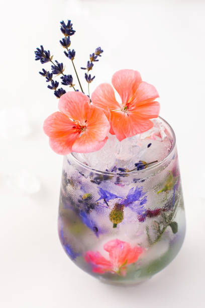 Cold drink with frozen flowers