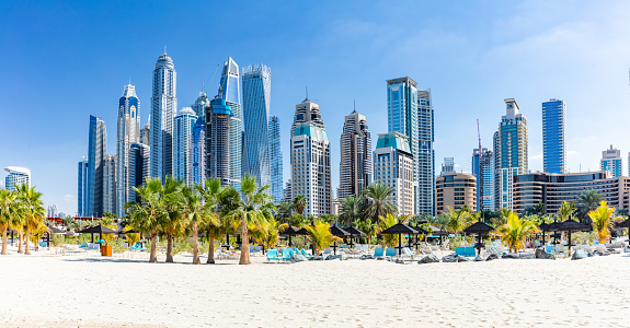 Dubai jumeirah beach with marina skyscrapers in UAE. Popular public JBR beach