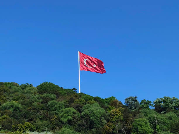 istock Turkish flag at mountain with clear blue sky. 1412707755