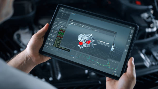 istock Car repairman makes wireless car diagnostics 1412708199
