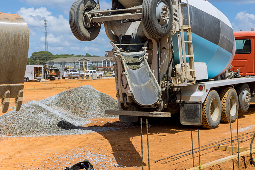 It was responsibility concrete mixer truck to transport the fresh concrete to foundation on preparation for pouring concrete in construction zone