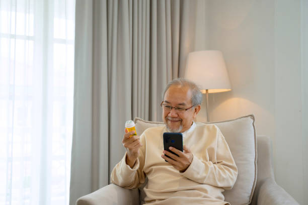 istock Senior man is find information about medicine on an internet. 1412711752