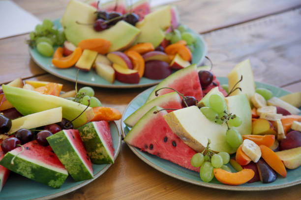 istock Fresh cut fruit served on the restaurant table 1412715673