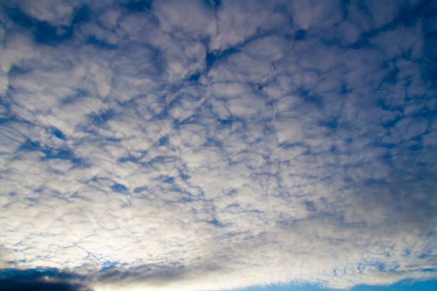 istock Clouds in the sky. White cloud in the blue sky. 1412718186