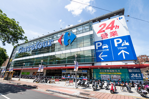 Kaohsiung, Taiwan- July 19, 2022: Building view of Carrefour Hypermarket in Kaohsiung, Taiwan. is a French multinational retail corporation headquartered in Massy, France.