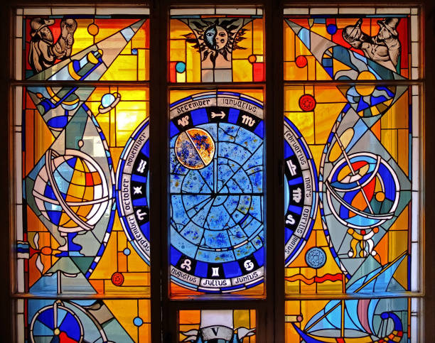 Color stained-glass window in the window on the theme of astronomy and astrology, signs of the zodiac stock photo