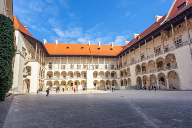 The Wawel Castle inside court is a castle residency Krakow, Poland - 14 March, 2022: The Wawel Castle inside court is a castle residency. Travel wawel cathedral stock pictures, royalty-free photos & images
