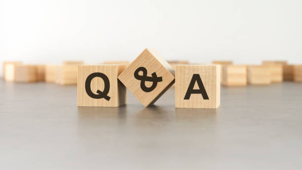 istock Q and A - question and answer shot form on wooden block 1412720018