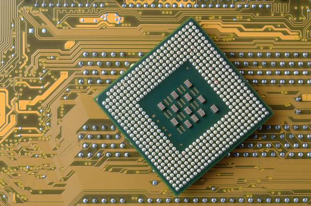 istock microprocessor from the computer lies on the motherboard. close-up. view from above. 1412724921
