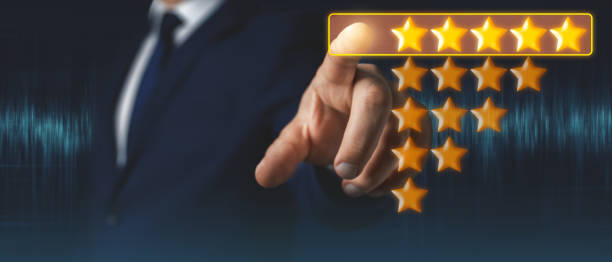 istock Businessman hand touches five stars rating feedback on virtual screen 1412727463