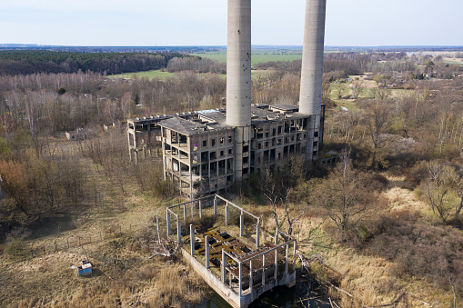 Ruin coal-fired power plant on the river Oder. The power plant never went into operation. Eisenhuettenstadt, Germany