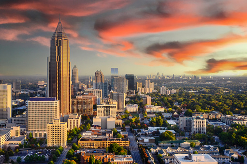 Spectacular view of the Atlanta, Georgia skyline at sunrise. Atlanta is the capital of and the most populous city in the U.S. state of Georgia, with an estimated 2015 population of 463,878. It is the cultural and economic center of the Atlanta metropolitan area, home to 5,522,942 people and the ninth largest metropolitan area in the United States. Atlanta is the county seat of Fulton County, and a small portion of the city extends eastward into DeKalb County.