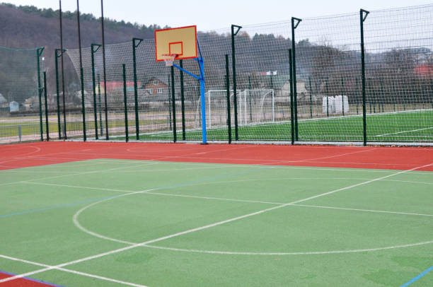 istock Modern multifunctional playing sports with an artificial covering playground 1412731859